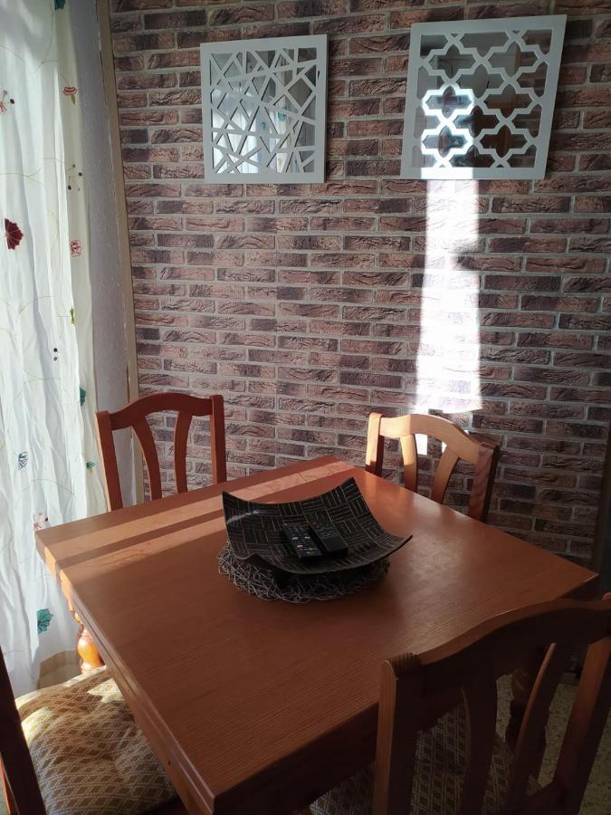 Atico Isaac Albeniz Apartment ลาปีเนดา ภายนอก รูปภาพ